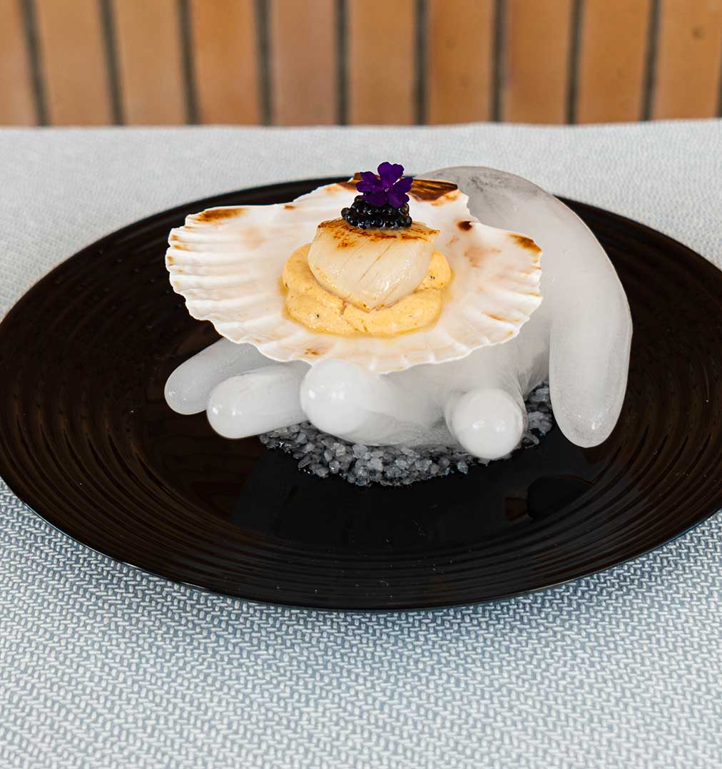 Receta de Vieira con mayonesa en su coral